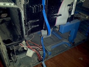 PcComputerGuy will have this looking spic-and-span in no-time!!! A photo of the dusty insides of a computer.